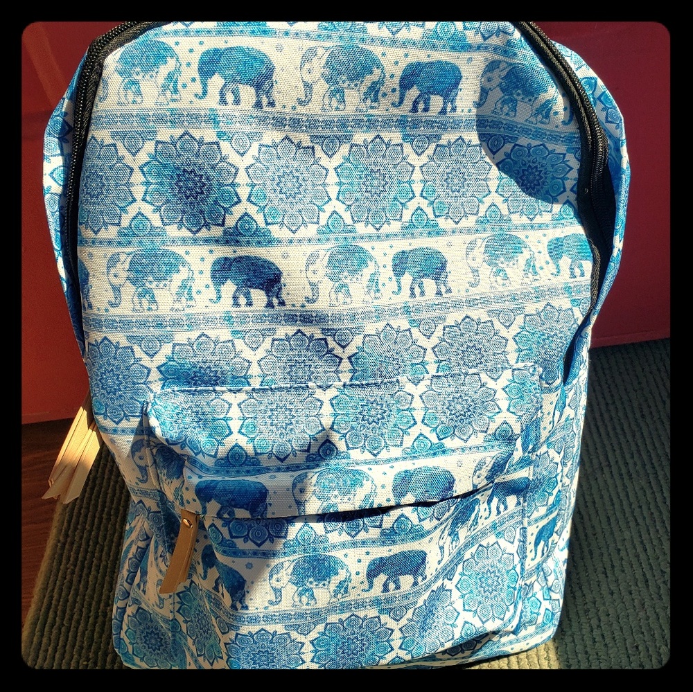 Blue and white elephant pattern backpack.